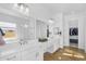 Luxurious bathroom with double vanities, a soaking tub, and a walk-in shower at 8140 E June St, Mesa, AZ 85207