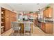 Spacious kitchen with granite counters, a large island, and ample storage space at 826 W Royal Palms Dr, Gilbert, AZ 85233