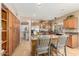 Well-equipped kitchen featuring granite countertops, an island, and ample wood cabinetry at 826 W Royal Palms Dr, Gilbert, AZ 85233