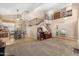 Open-concept living space with a staircase, dining area, and loft, perfect for entertaining and Gathering gatherings at 826 W Royal Palms Dr, Gilbert, AZ 85233