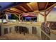 Outdoor kitchen boasts stainless steel grill, cooking equipment, and ample seating at 826 W Royal Palms Dr, Gilbert, AZ 85233