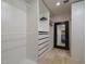Walk-in closet with built-in shelving and drawers, offering ample storage space at 8433 E Cholla St, Scottsdale, AZ 85260