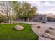 Inviting home featuring desert landscaping, mature trees, and a tranquil setting at 8433 E Cholla St, Scottsdale, AZ 85260