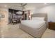 Spacious bedroom with a king-size bed, stylish seating, and access to the outdoor patio at 8433 E Cholla St, Scottsdale, AZ 85260