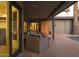 Covered patio with comfortable outdoor seating and access to the pool at 8433 E Cholla St, Scottsdale, AZ 85260