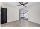 Bright bedroom with a view of the backyard pool through sliding glass doors at 8602 W Clarendon Ave, Phoenix, AZ 85037