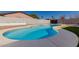 Backyard pool with cool blue water and desert landscaping at 8602 W Clarendon Ave, Phoenix, AZ 85037