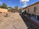 Large backyard area offering privacy, potential for customization, and outdoor enjoyment at 8900 E Rainier Dr, Gold Canyon, AZ 85118