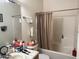 Bathroom featuring a shower-tub combo and a vanity with mirror and ample counter space at 8900 E Rainier Dr, Gold Canyon, AZ 85118