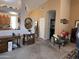 An open living room area features an oval mirror and a desk at 8900 E Rainier Dr, Gold Canyon, AZ 85118