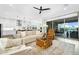 Spacious living room with an open floor plan leading to the backyard at 9960 E Revolution Dr, Mesa, AZ 85212