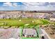 Aerial view of property and community with golf course nearby at 11203 N Northfield St, Surprise, AZ 85388
