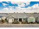 Charming single-story home featuring a well-manicured front yard and inviting covered porch at 11203 N Northfield St, Surprise, AZ 85388