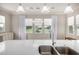 Kitchen with quartz countertops, stainless faucet, and a window view at 11203 N Northfield St, Surprise, AZ 85388