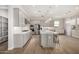 Spacious kitchen with stainless steel appliances, quartz countertops, and gray cabinets at 11203 N Northfield St, Surprise, AZ 85388