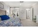 Main bedroom features a sliding barn door to a walk-in closet at 11203 N Northfield St, Surprise, AZ 85388