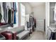 Walk-in closet includes built-in bench, shelving, and dresser for optimal organization at 11203 N Northfield St, Surprise, AZ 85388