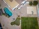 Expansive backyard featuring a sparkling pool, putting green, and basketball court at 11225 E Starflower Ct, Chandler, AZ 85249