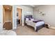 A well-lit bedroom with tasteful decor and furnishings, featuring a comfortable bed at 11225 E Starflower Ct, Chandler, AZ 85249