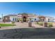 Elegant home with a well-manicured lawn and charming curb appeal at 11225 E Starflower Ct, Chandler, AZ 85249
