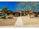 Charming single-story home featuring desert landscaping and a welcoming walkway at 13226 N Cedar Dr, Sun City, AZ 85351
