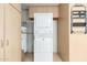 Neat laundry area equipped with a washer and dryer unit with additional storage cabinets at 13226 N Cedar Dr, Sun City, AZ 85351