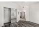 Cozy bedroom features wood-look floors and a mirrored closet at 15225 N 100Th St # 2210, Scottsdale, AZ 85260
