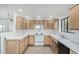 Functional kitchen with ample counter space and white appliances and a window over the sink at 15225 N 100Th St # 2210, Scottsdale, AZ 85260