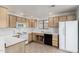 Bright kitchen with white appliances and plenty of cabinet storage at 15225 N 100Th St # 2210, Scottsdale, AZ 85260