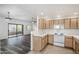 Open kitchen with essential appliances and ample cabinet storage, seamlessly connected to the living space at 15225 N 100Th St # 2210, Scottsdale, AZ 85260