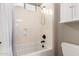 Bathroom featuring updated fixtures, shower and tub combo, and updated vanity at 15936 W Bonitos Dr, Goodyear, AZ 85395