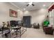 Spacious office with dual monitors, a secure Champion safe, and comfortable seating at 15936 W Bonitos Dr, Goodyear, AZ 85395