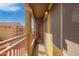 Private balcony with stucco exterior, offering a cozy outdoor living space with neighborhood views at 17150 N 23Rd St # 249, Phoenix, AZ 85022