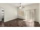 Bright living room with tile floors, ceiling fan, and sliding door to patio at 17150 N 23Rd St # 249, Phoenix, AZ 85022