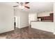 Spacious living area with tile flooring and an open layout leading to the kitchen at 17150 N 23Rd St # 249, Phoenix, AZ 85022