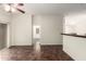 Open-concept living room with access to other rooms and outdoor patio at 17150 N 23Rd St # 249, Phoenix, AZ 85022