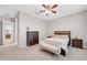 Bedroom featuring neutral walls, ceiling fan, and furnishings with simple lines at 18837 N Cook Dr, Maricopa, AZ 85138