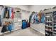 Walk-in closet featuring shelving and space for organization at 18837 N Cook Dr, Maricopa, AZ 85138