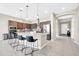 Stylish kitchen featuring a large island with seating, stainless steel appliances, and modern finishes at 18837 N Cook Dr, Maricopa, AZ 85138