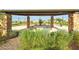 Gather under the shade structure in this well-maintained common area with picnic tables and desert landscaping at 2330 E Lieber Pl, Phoenix, AZ 85024