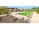Enjoy the beautiful landscaping, bocce ball court, and picnic area in this well-maintained common area at 2330 E Lieber Pl, Phoenix, AZ 85024