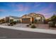 Well-maintained single-Gathering home with a two-car garage, desert landscaping, and a spacious driveway at 2330 E Lieber Pl, Phoenix, AZ 85024