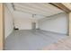Spacious two-car garage with epoxy flooring, and a large storage capacity at 2330 E Lieber Pl, Phoenix, AZ 85024