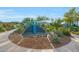 Neighborhood playground featuring a blue slide, surrounded by lush greenery and trees, perfect for Gathering fun at 2330 E Lieber Pl, Phoenix, AZ 85024