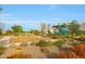 Community playground with swing set, slide, and walking path at 2330 E Lieber Pl, Phoenix, AZ 85024