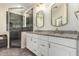 Bathroom with granite counters, dual sinks, walk-in shower and tile flooring at 2551 E Buena Vista Pl, Chandler, AZ 85249