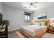 Stylish bedroom with a minimalist design, a large window, and a comfortable bed, perfect for relaxation at 2551 E Buena Vista Pl, Chandler, AZ 85249