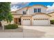 Charming two-story home with a three car garage and desert landscaping at 2551 E Buena Vista Pl, Chandler, AZ 85249