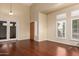 Spacious living room featuring hardwood floors, natural light, and a welcoming atmosphere at 2551 E Buena Vista Pl, Chandler, AZ 85249