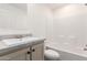 Fresh bathroom with a single sink vanity, updated countertop, and a shower-tub combo at 2650 W Union Hills Dr # 123, Phoenix, AZ 85027